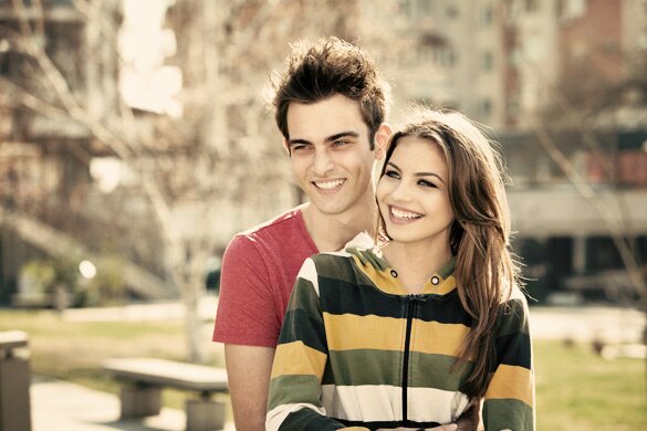 young couple having fun in the park